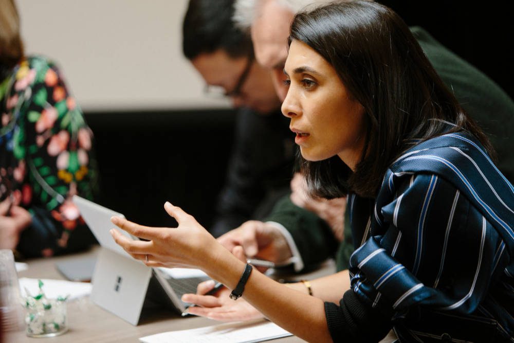 Cambridge Executive MBA participant working in a study group