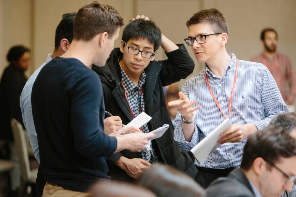 Executive MBA participants working in a study group