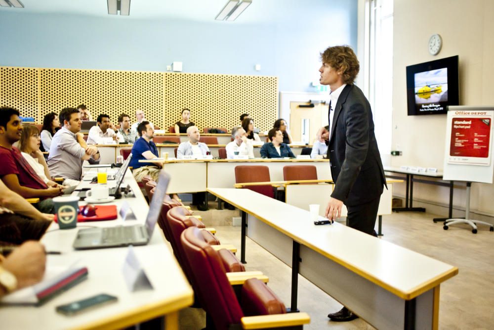 A Cambridge Executive MBA lecture in Lecture Theatre 3, Cambridge Judge Business School